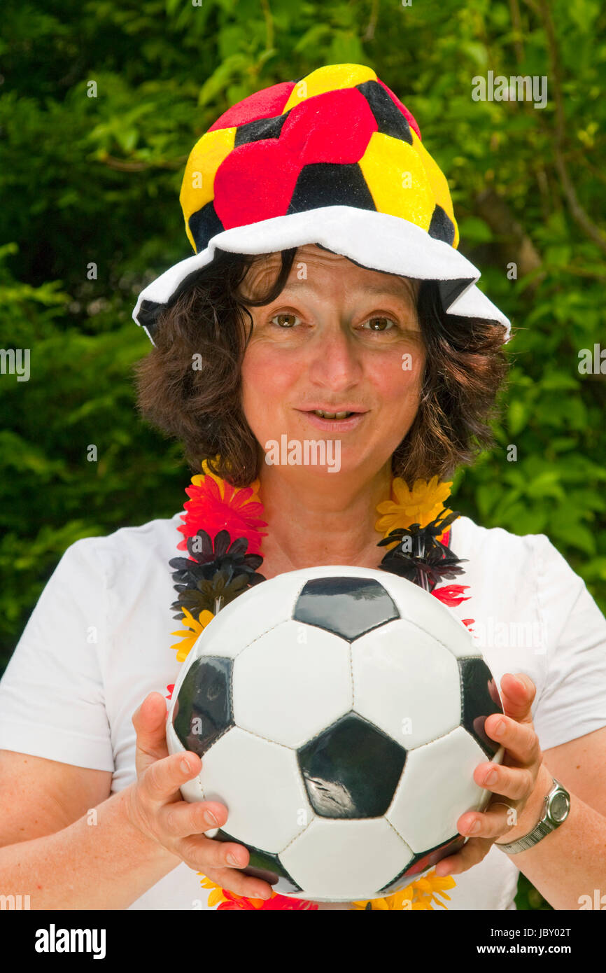 Female soccer fan with hat outdoor shot Stock Photo Alamy