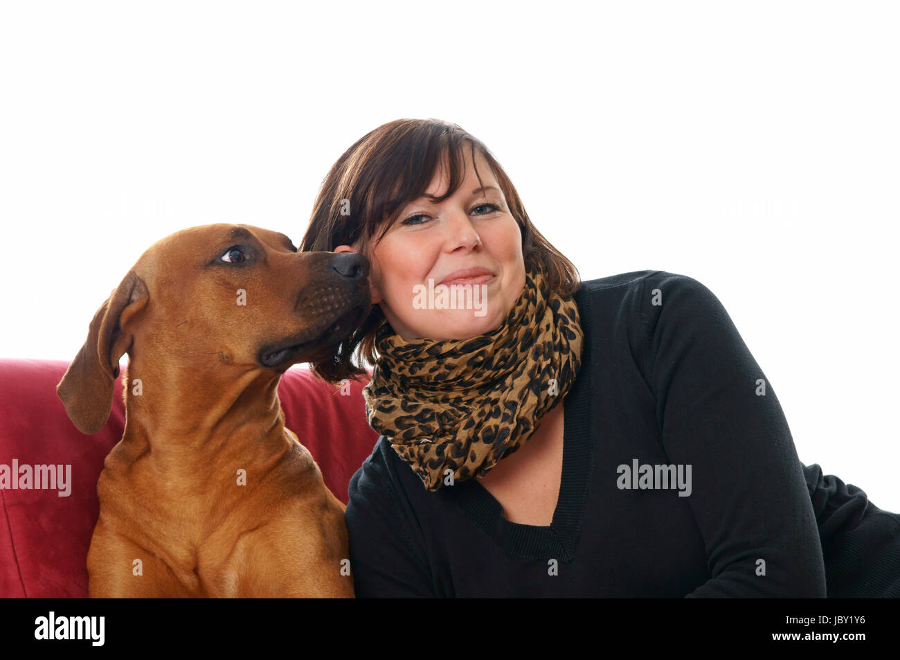 Young woman with her dog Stock Photo