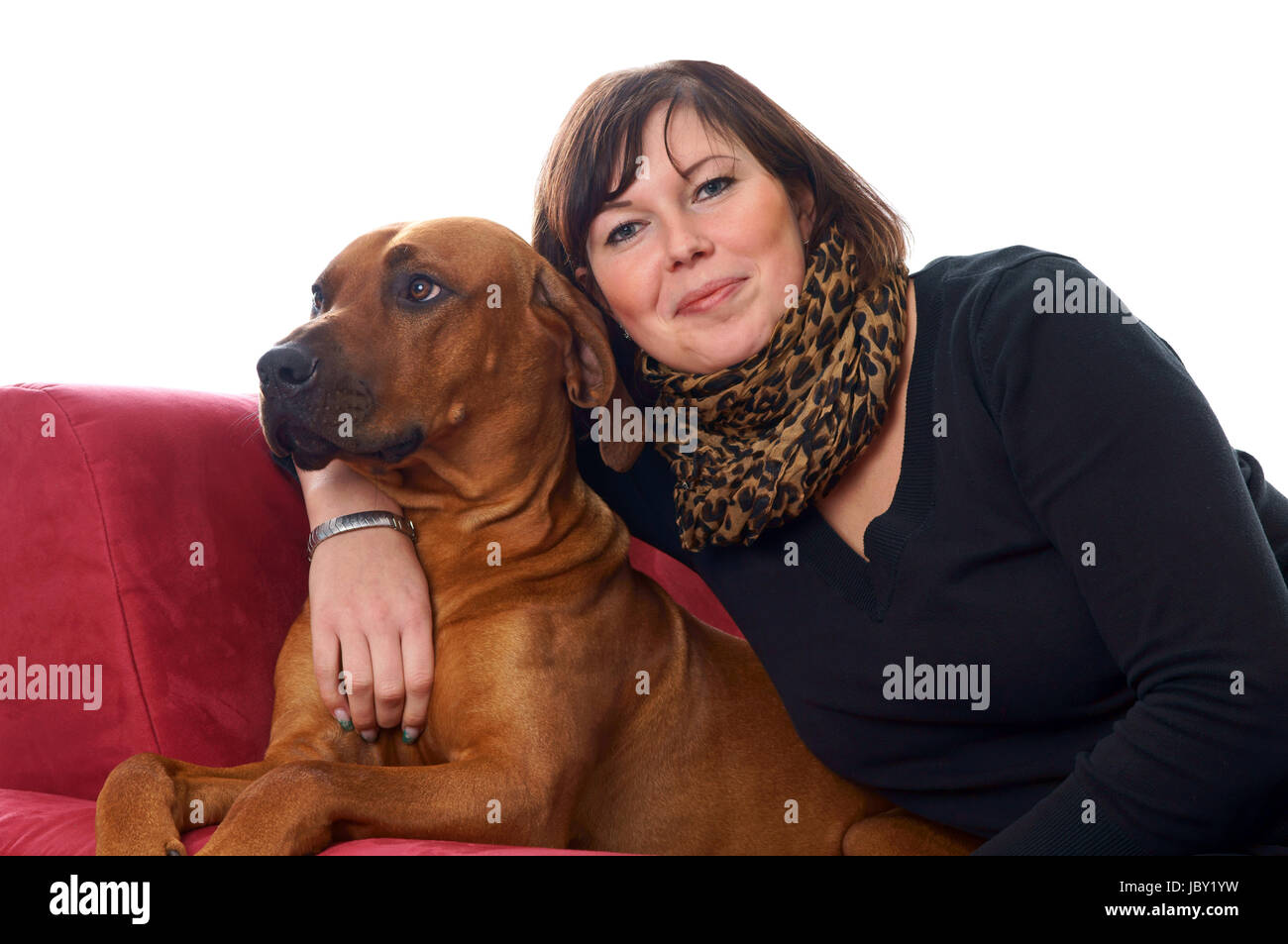 Young woman with her dog Stock Photo