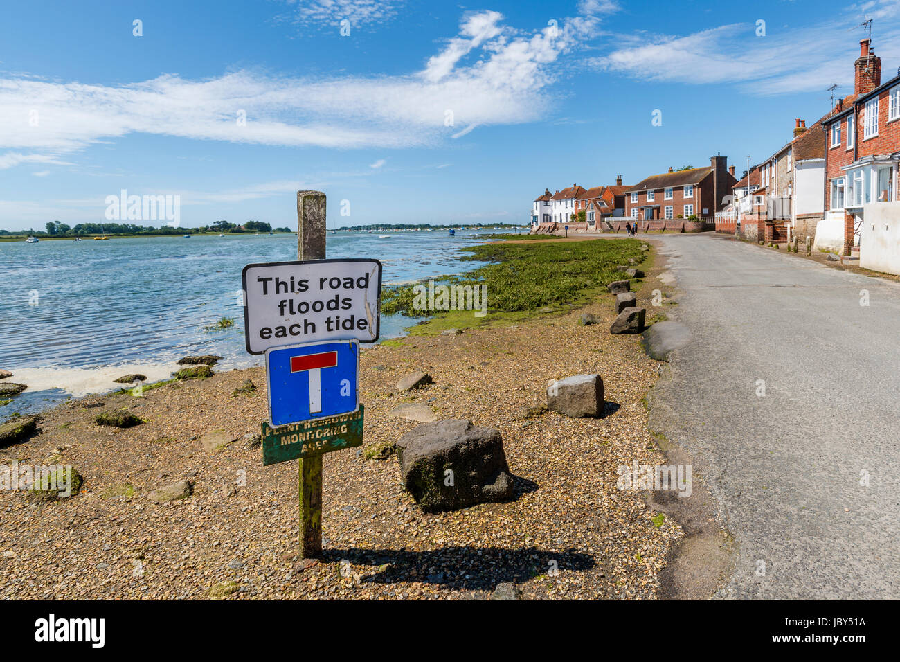 Seafront road, floods at high tide, Bosham, a south coast coastal village in Chichester Harbour near Chichester West Sussex, southern England, UK Stock Photo