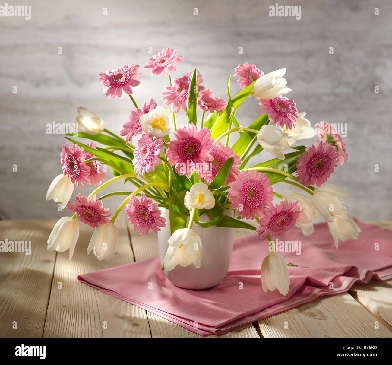 Bouquet of flowers with tulips and gerberas. Stock Photo
