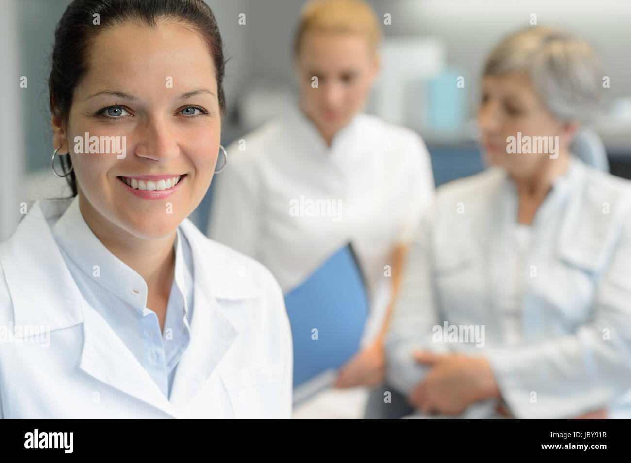 Professional dentist woman nurse with patient woman dental surgery