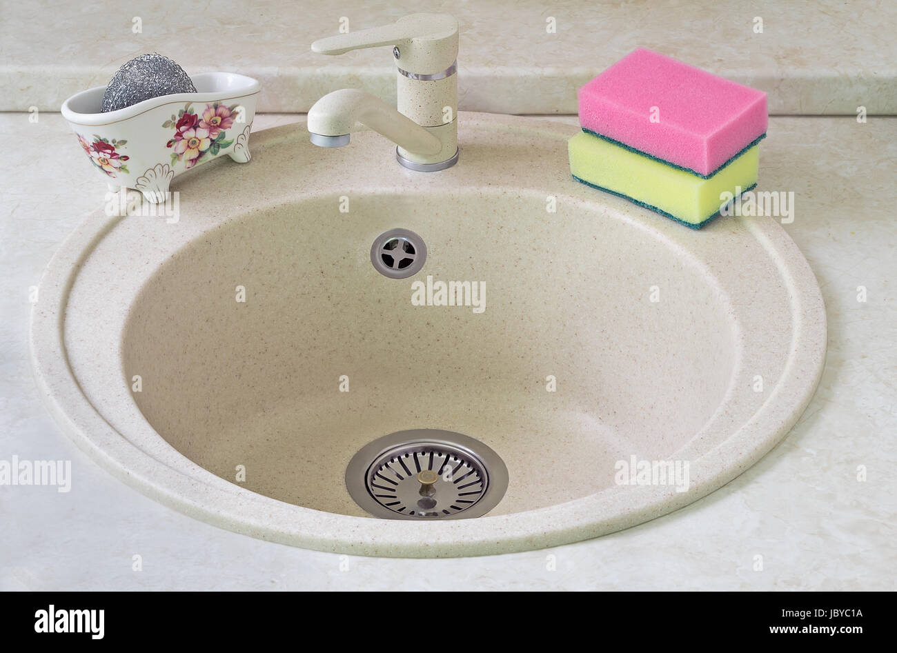 Convenient sink for ware from metal ceramics with convenient to plums from stainless steel. Stock Photo