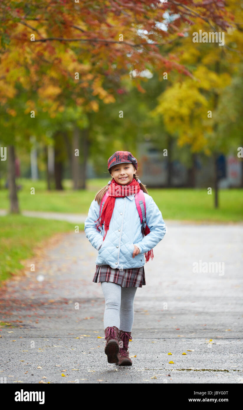 Portrait of happy schoolgirl in casual going to school Stock Photo - Alamy