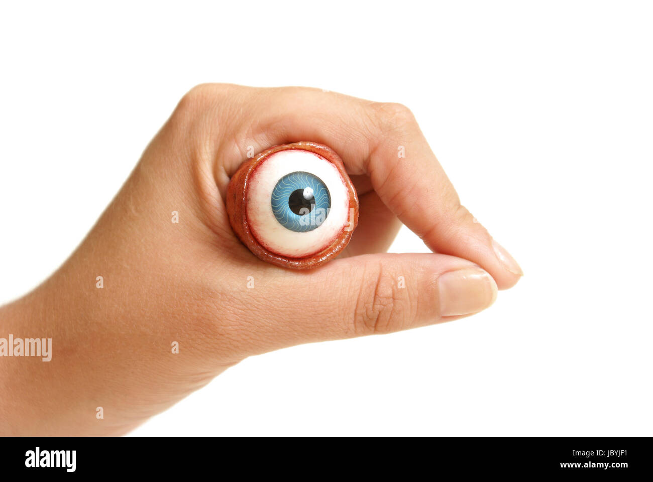 A person holds an eyeball in their hand Stock Photo Alamy