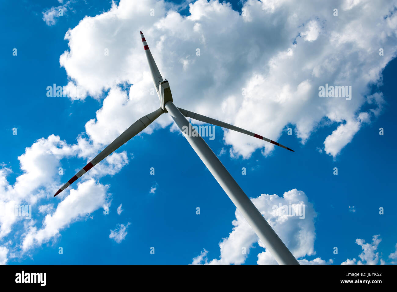 wind farm on cloudy blue sky background Stock Photo - Alamy