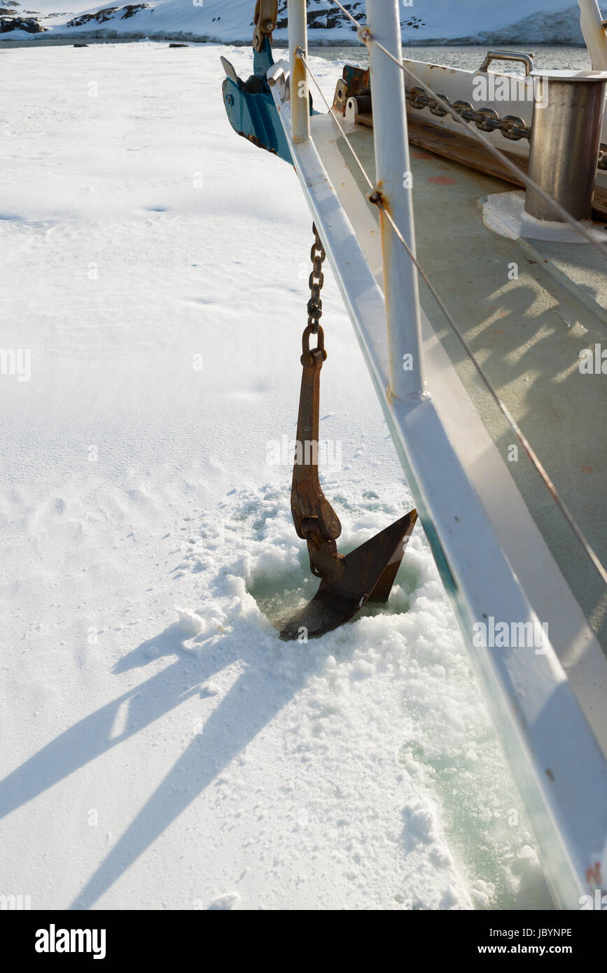 Sailing boat stuck in ice sheet in Antarctica dropping anchor Stock Photo Alamy