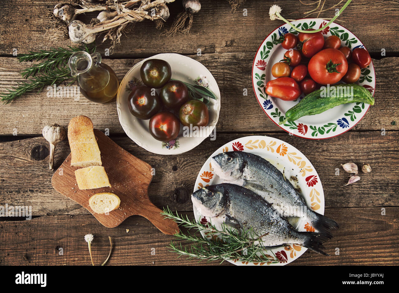 Healthy eating. Bream fish preparation. Seafood with vegetables Stock Photo Alamy
