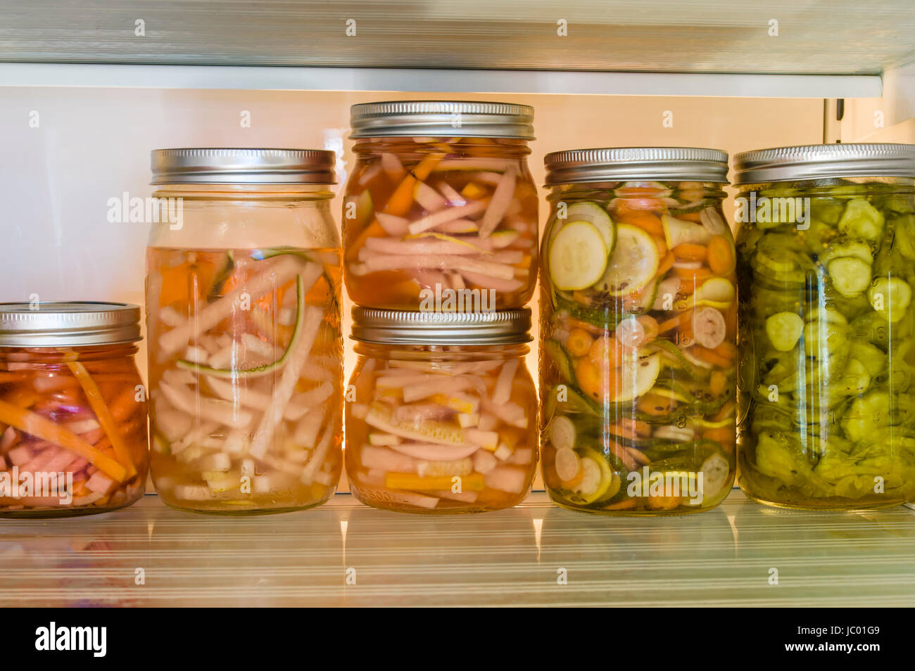Sliced vegetables being pickled using cold vinegar method Stock Photo Alamy