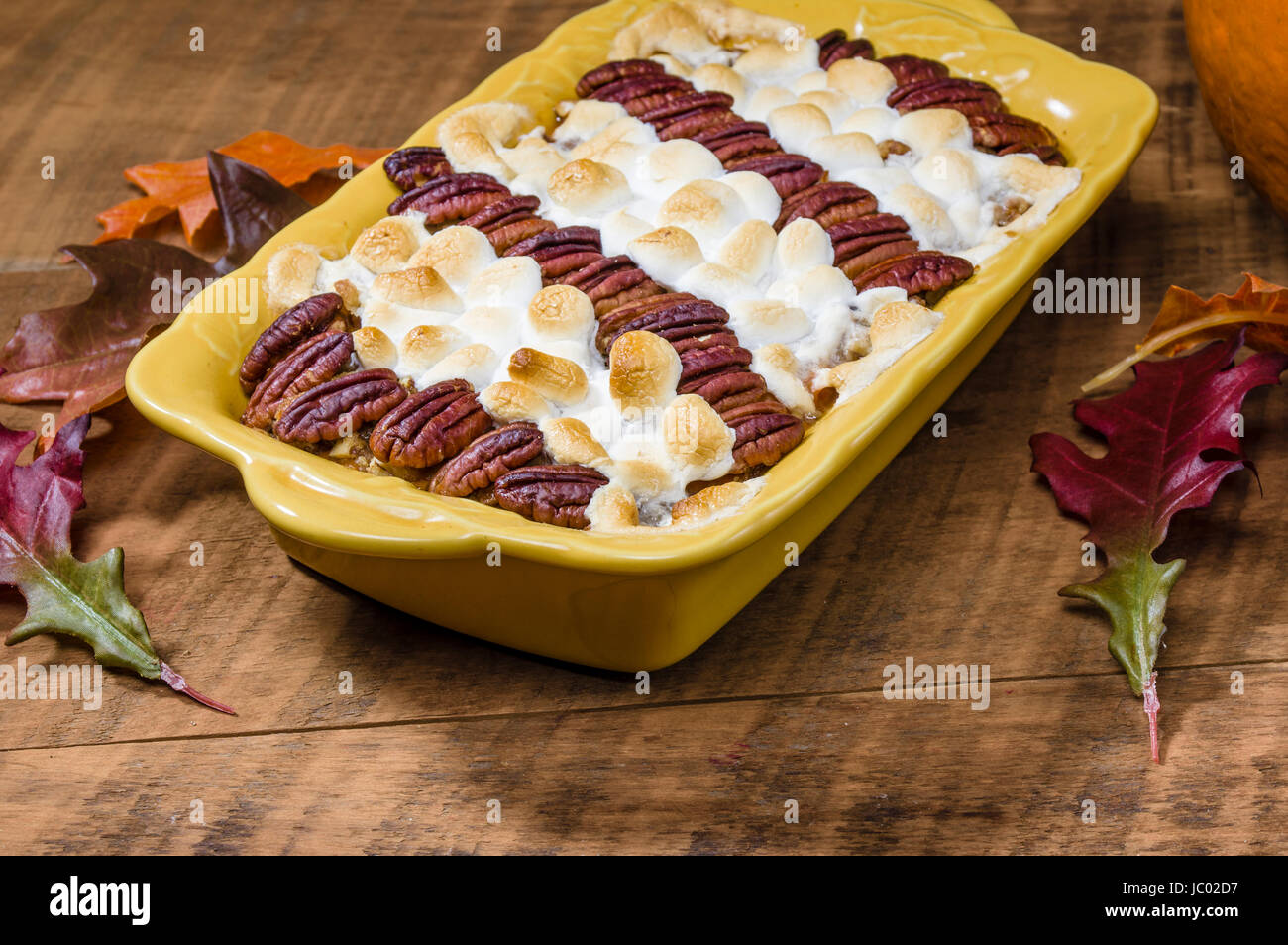 Sweet potato casserole with pecans and marshmallow topping Stock Photo