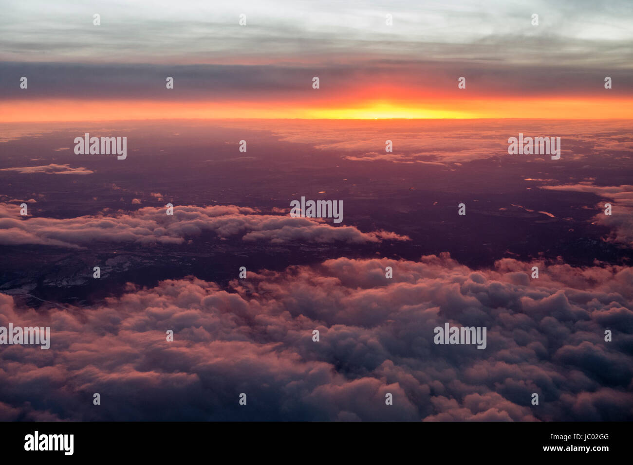 Aerial view of clouds and colorful sunrise for use as background or texture Stock Photo