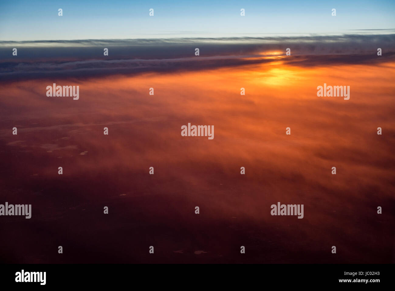 Aerial view of clouds and colorful sunrise for use as background or texture Stock Photo