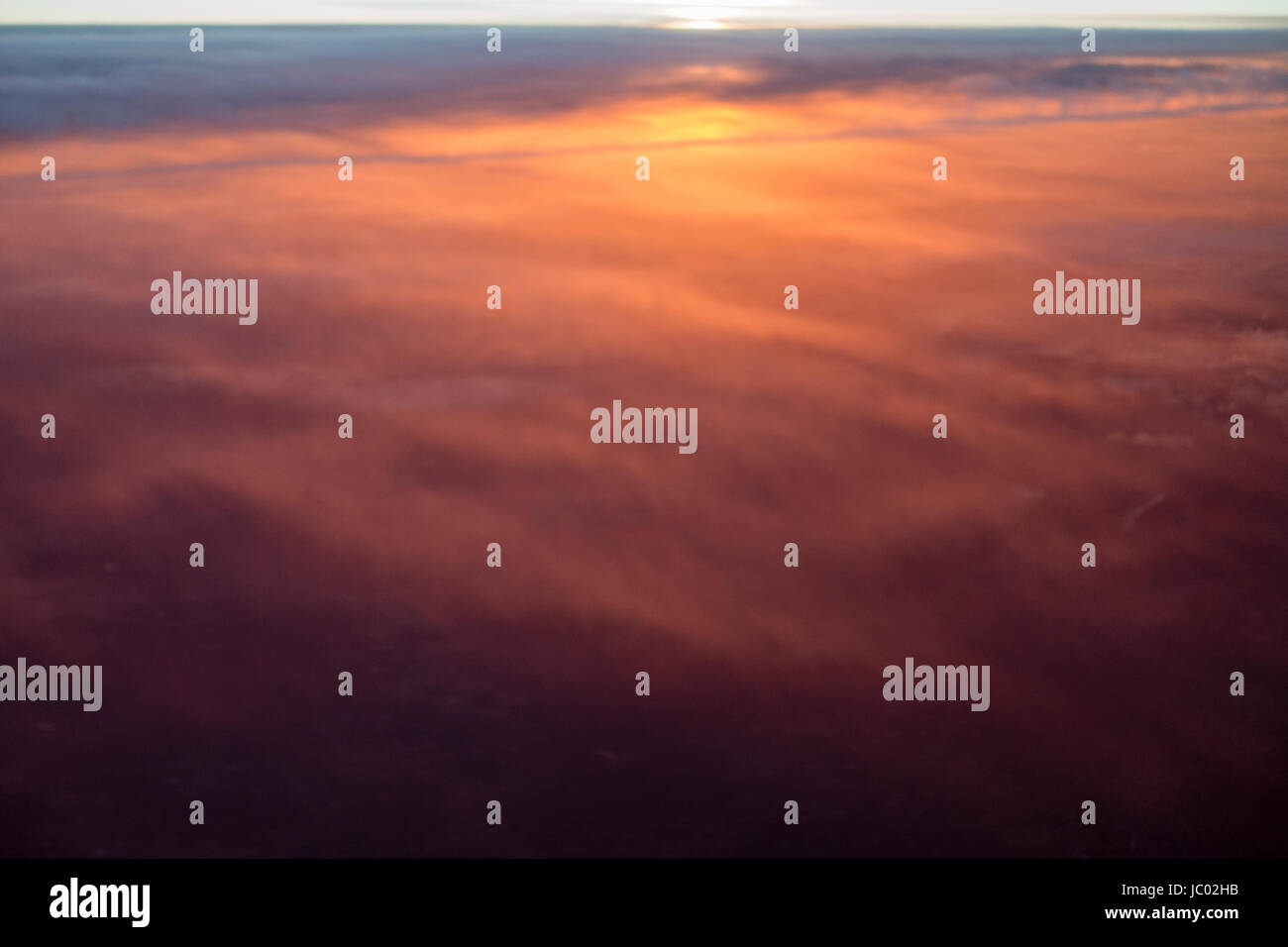 Aerial view of clouds and colorful sunrise for use as background or texture Stock Photo