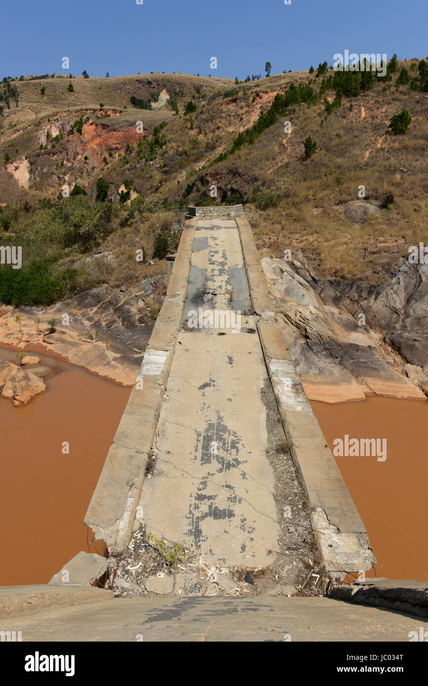 A former malagasy highway bridge connecting southern Madagascar to the center.The bridge was bombed ahead of the 2002 elections for political reasons. Stock Photo