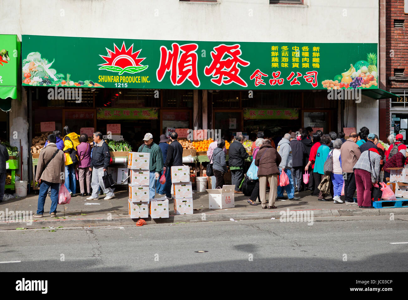 Shoppers at a chinatown produce market - San Francisco, California USA Stock Photo