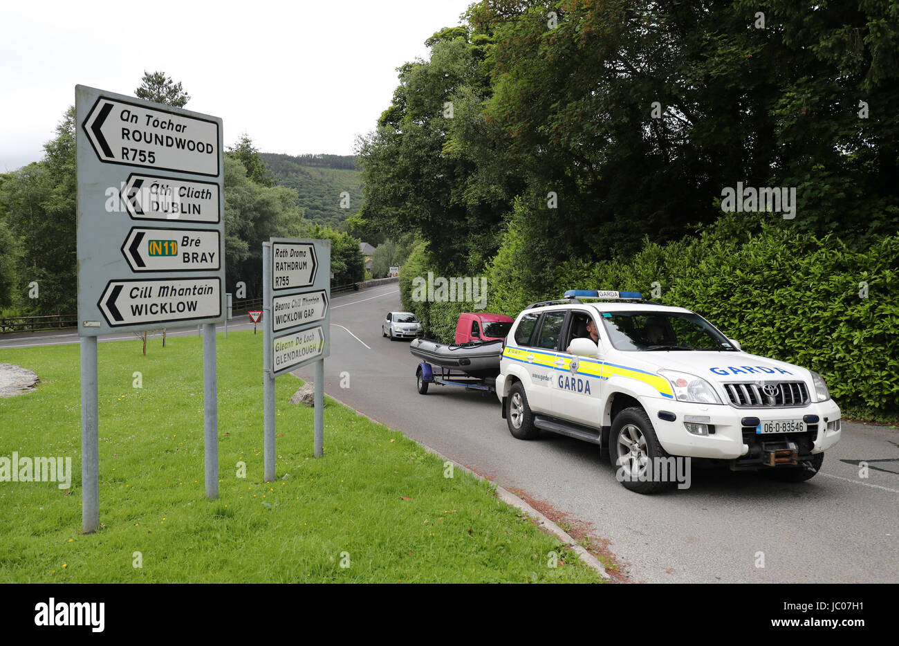 Members of the Garda water unit arrive in Laragh, Co Wicklow, after further human remains believed to be from a murdered young man have been found dumped in the Wicklow Mountains. Stock Photo
