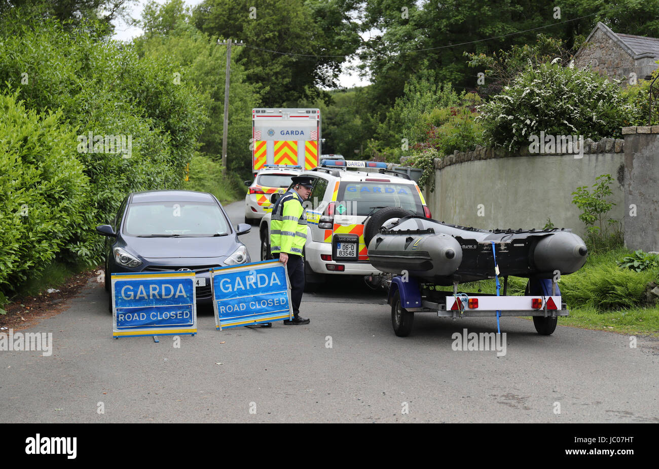 Members of the Garda water unit arrive in Laragh, Co Wicklow, after further human remains believed to be from a murdered young man have been found dumped in the Wicklow Mountains. Stock Photo