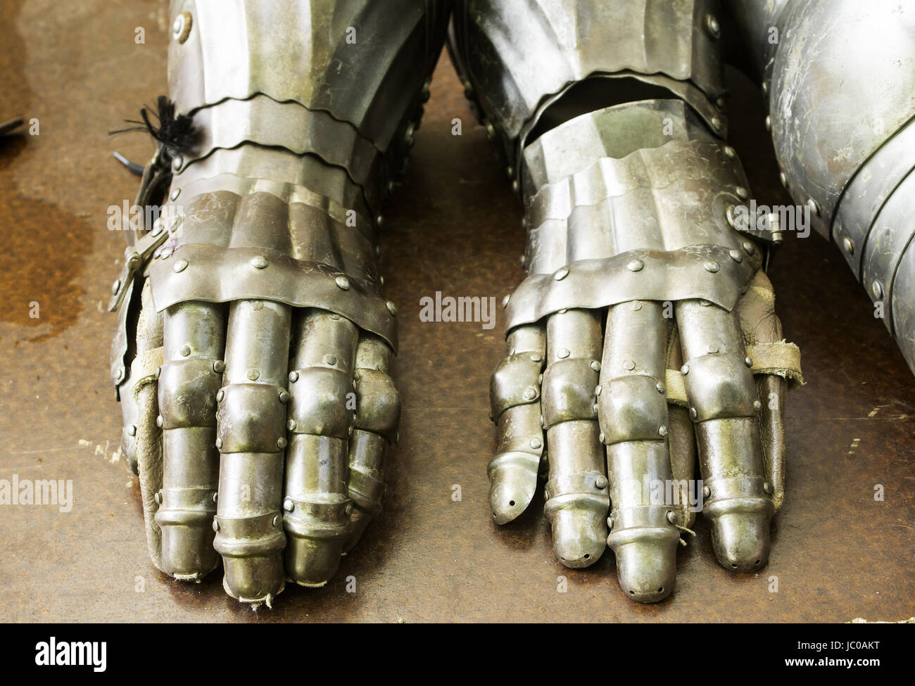 Medieval armor metal gloves, war and recreation Stock Photo Alamy