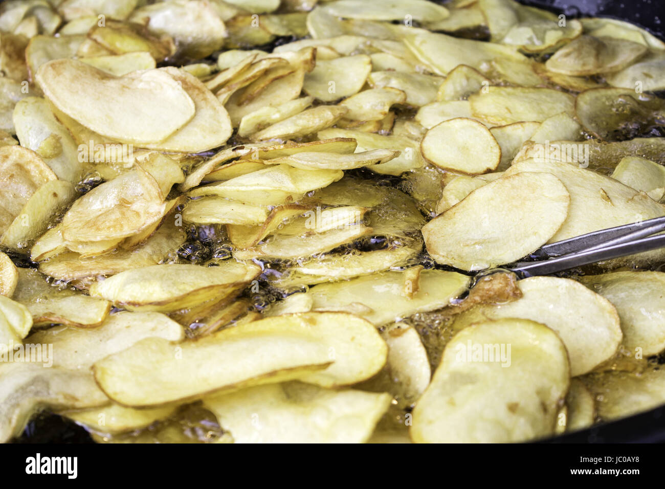 Frying pan potatoes restaurant, unhealthy food Stock Photo Alamy