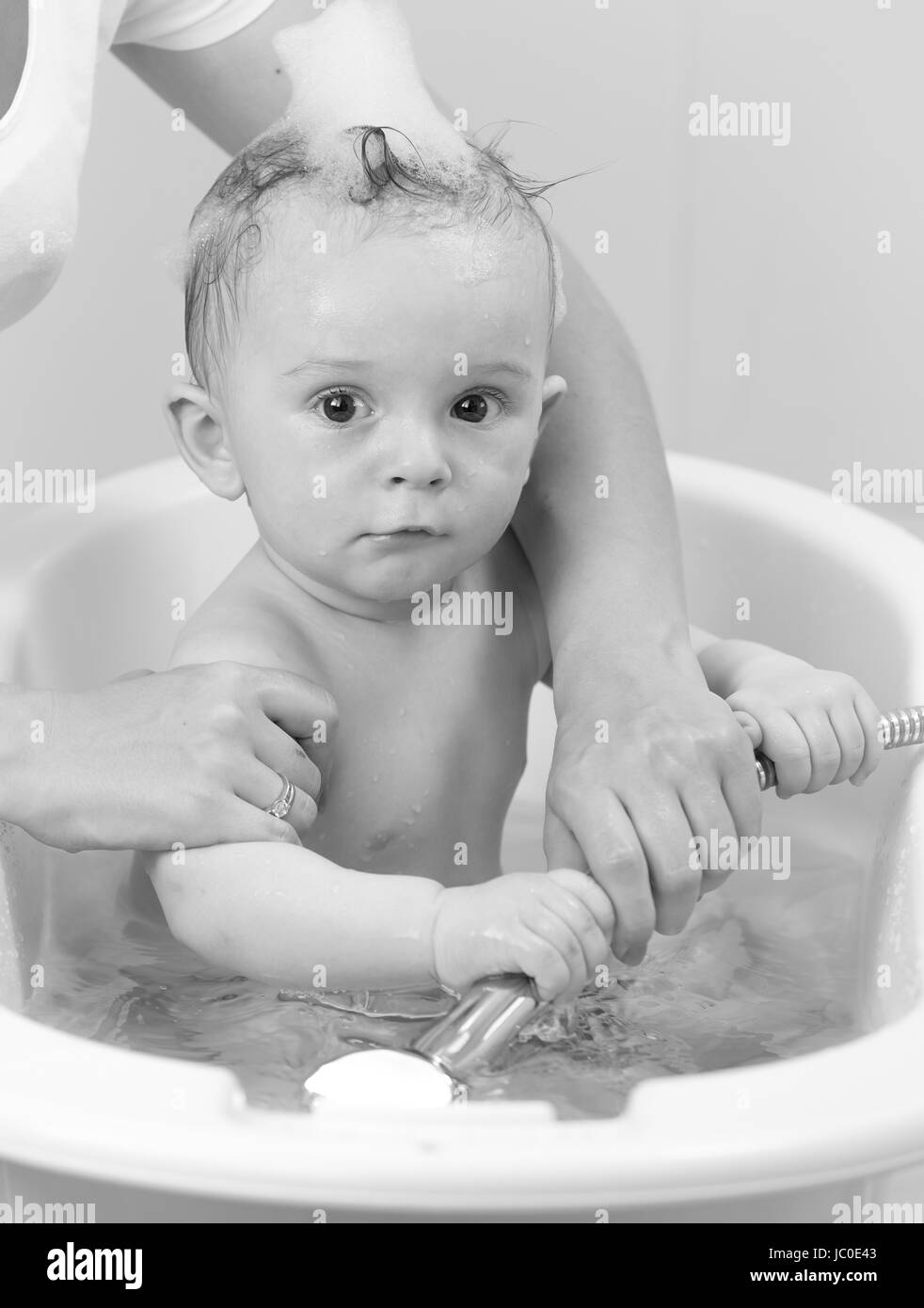 Child girl shower bathroom Black and White Stock Photos & Images - Alamy