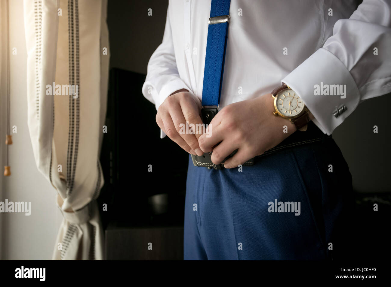 Wearing suspenders hi-res stock photography and images - Alamy