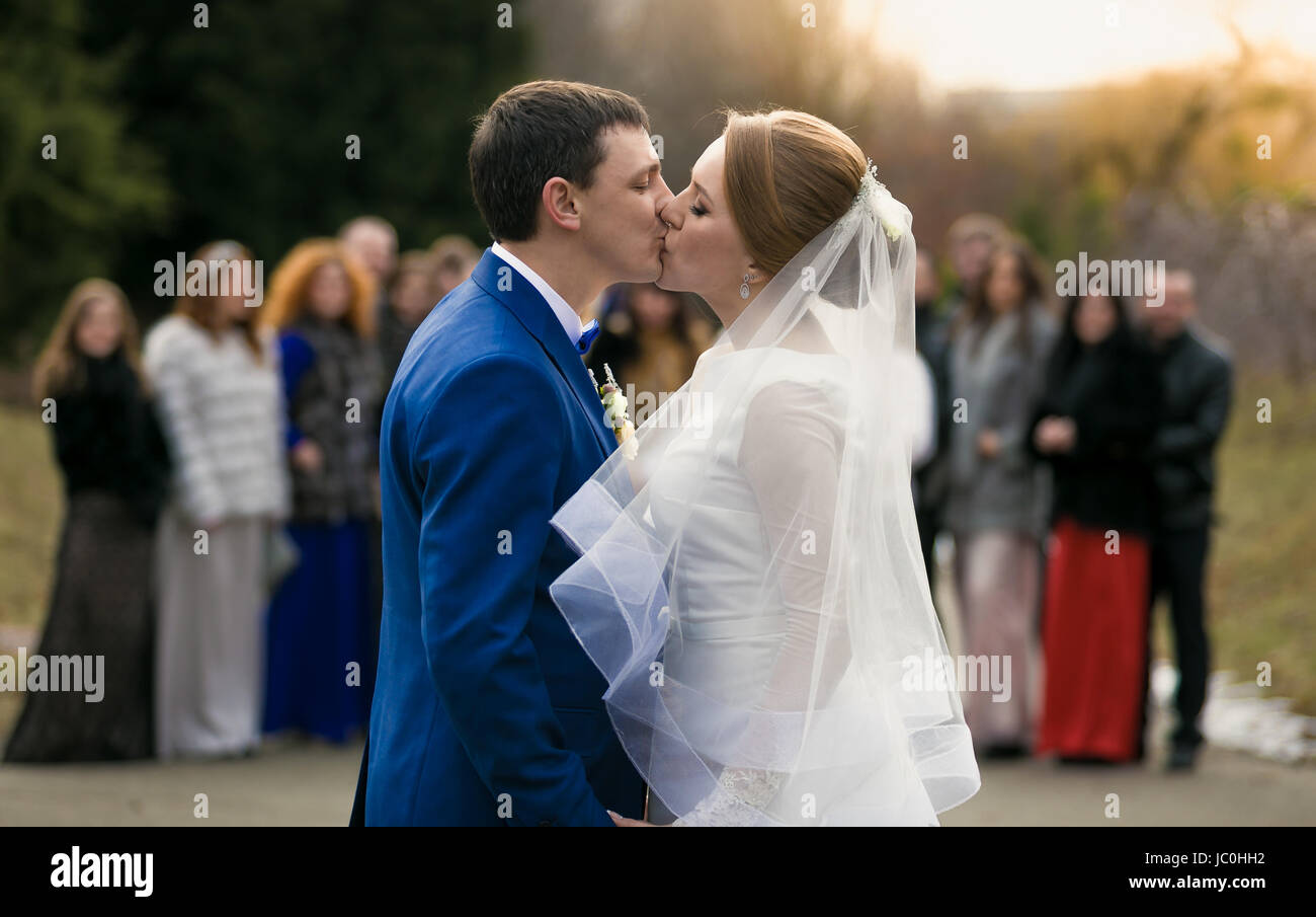 Newly married couple kissing in hi-res stock photography and images - Alamy