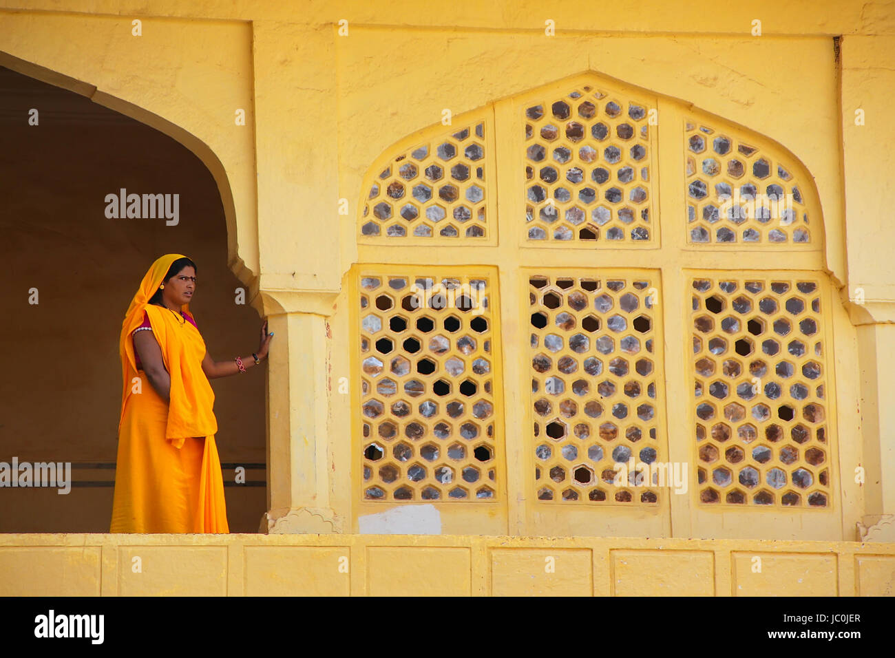 Indian woman standing in balcony hi-res stock photography and images ...