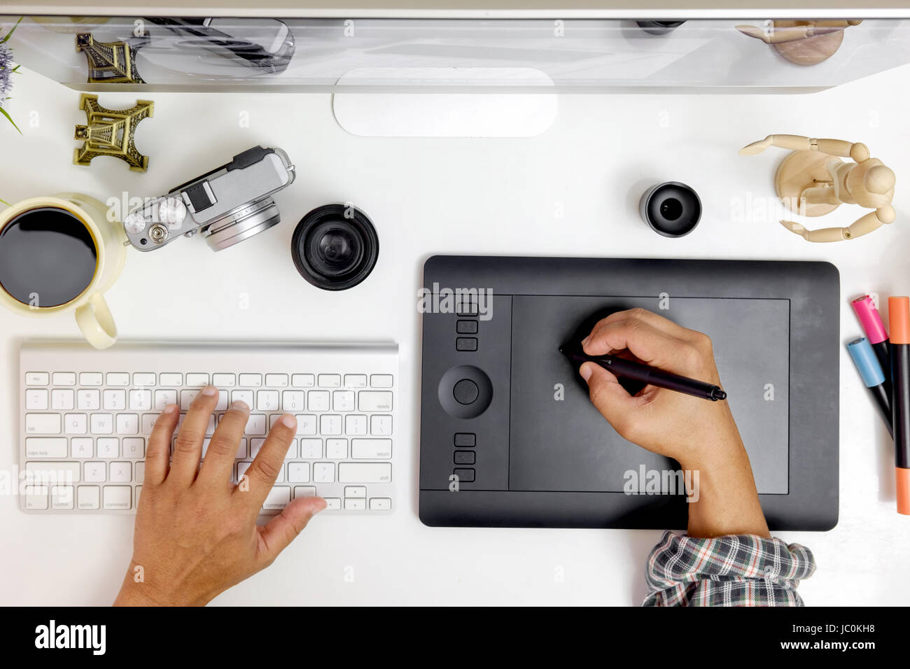 Designer desk , Designer hand drawing on digital tablet , Stylish ...