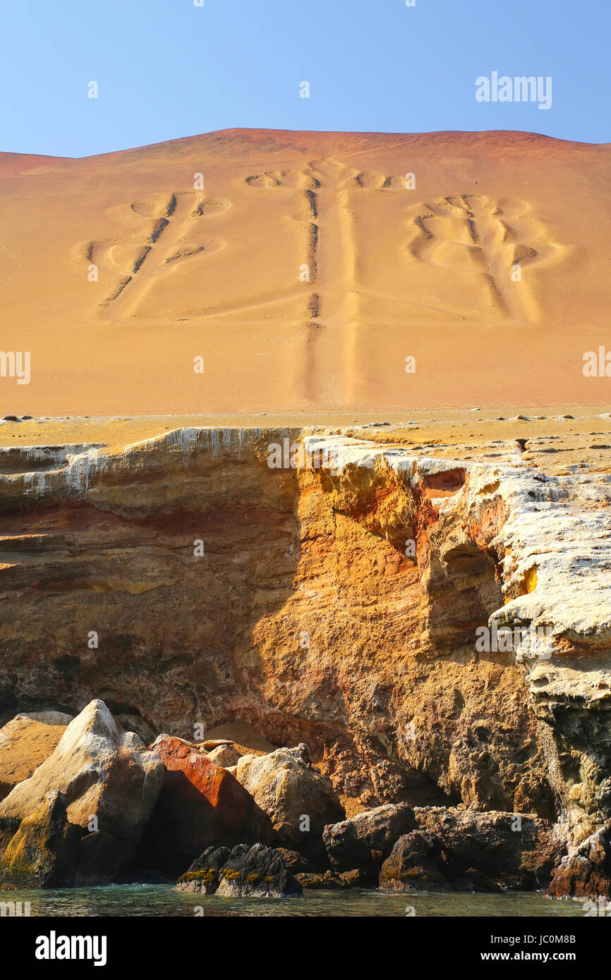 Candelabra of the Andes in Pisco Bay, Peru. Candelabra is a well-known prehistoric geoglyph found on the northern face of the Paracas Peninsula Stock Photo