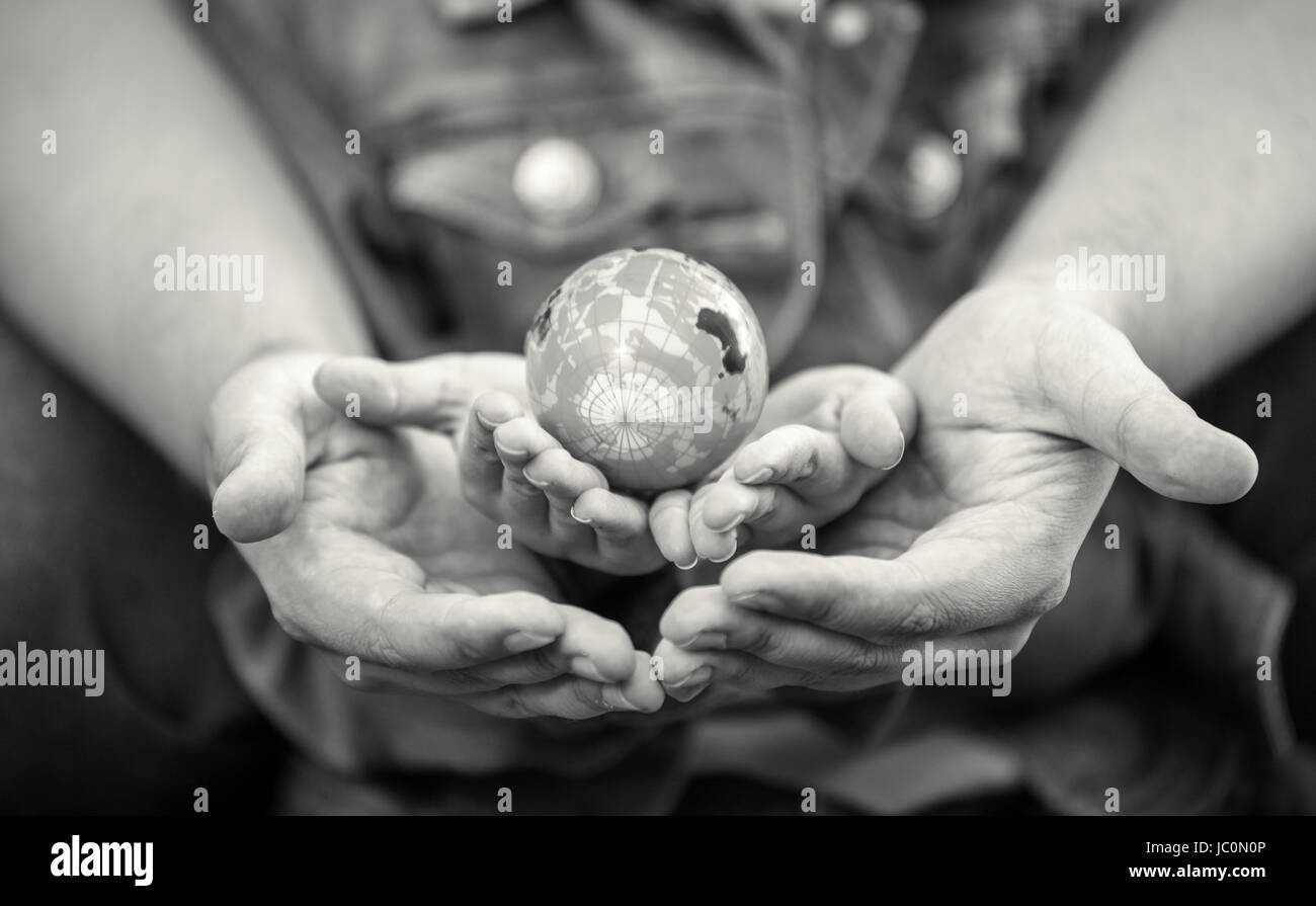 Girls hands holding globe hi-res stock photography and images - Alamy