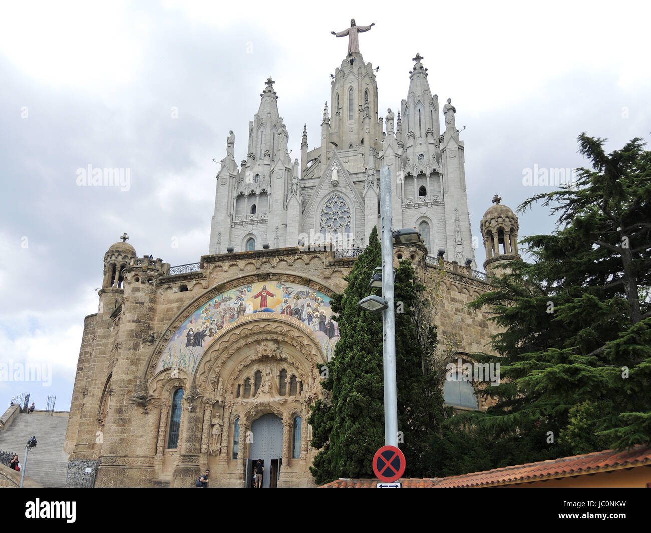 BARCELONA, SPAIN - AUGUST 14, 2013: entrance in Expiatory Church of the Sacred Heart of Jesus, Barcelona, Spain. The building is the work of the Spanish Catalan architect Enric Sagnier. Stock Photo