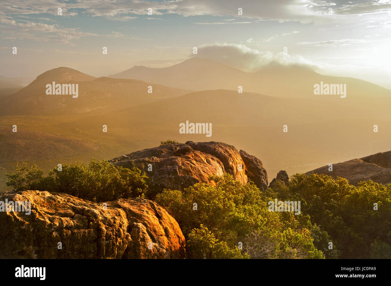 View from Cape Le Grand's Frenchman Peak in a hazy sunset. Stock Photo