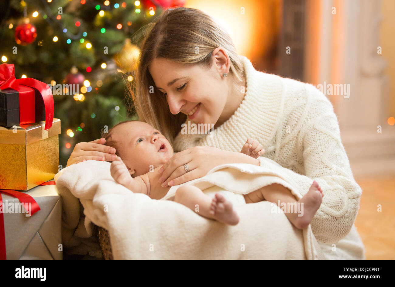 Newborn baby under tree hi-res stock photography and images - Alamy