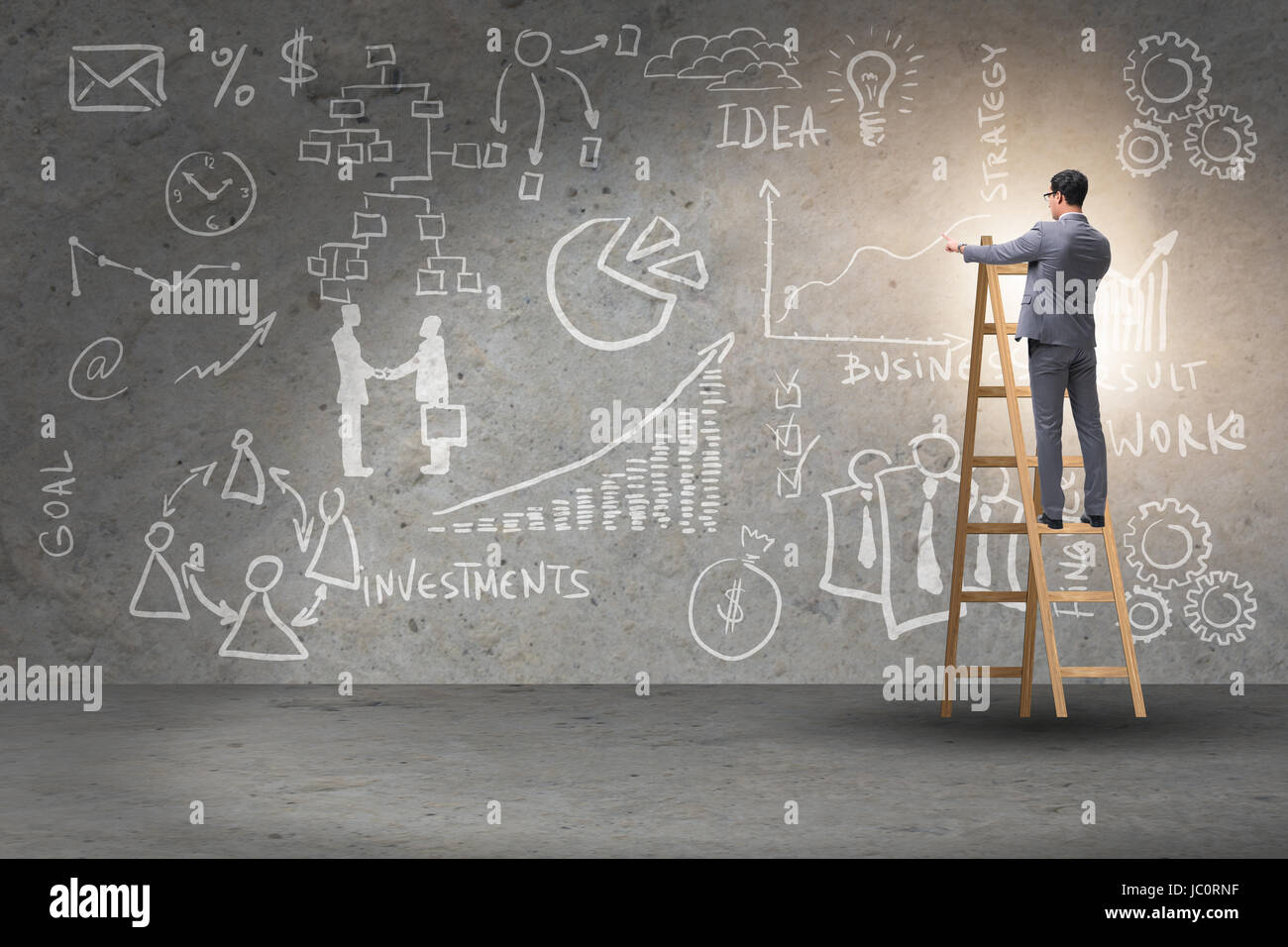 Businessman on ladder in business concept Stock Photo - Alamy