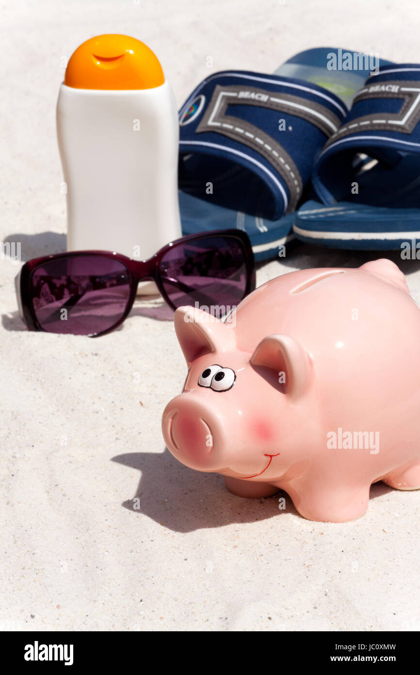 Urlaubsgeld für den Urlaub im Sparschwein sparen Stock Photo