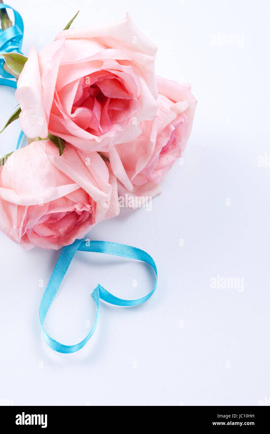 A bouquet of roses with ribbon in heart shape Stock Photo - Alamy