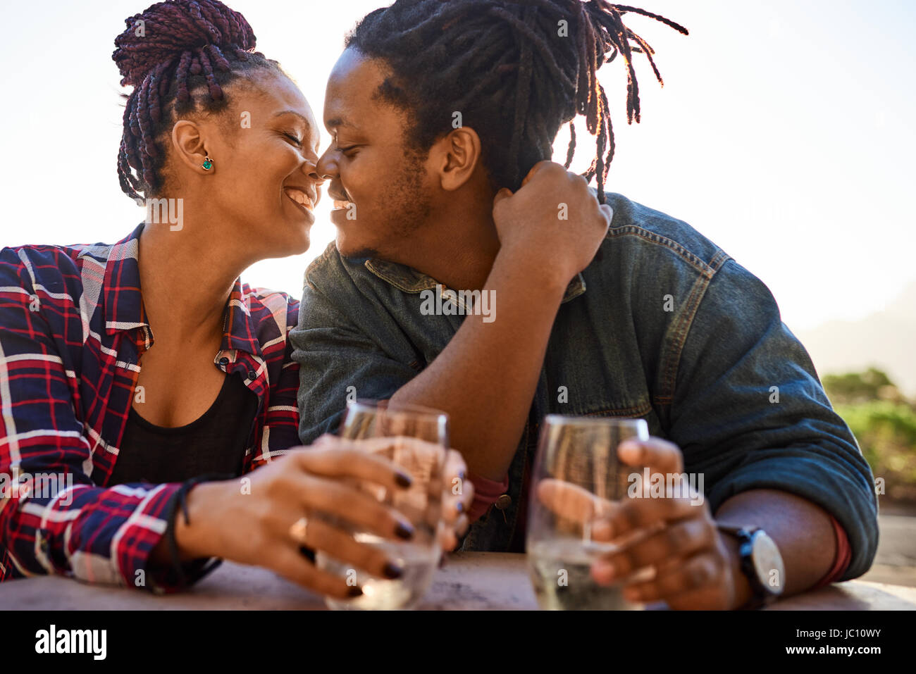 Real Couple Of African Descent About To Kiss While Embracing Stock   Real Couple Of African Descent About To Kiss While Embracing JC10WY 