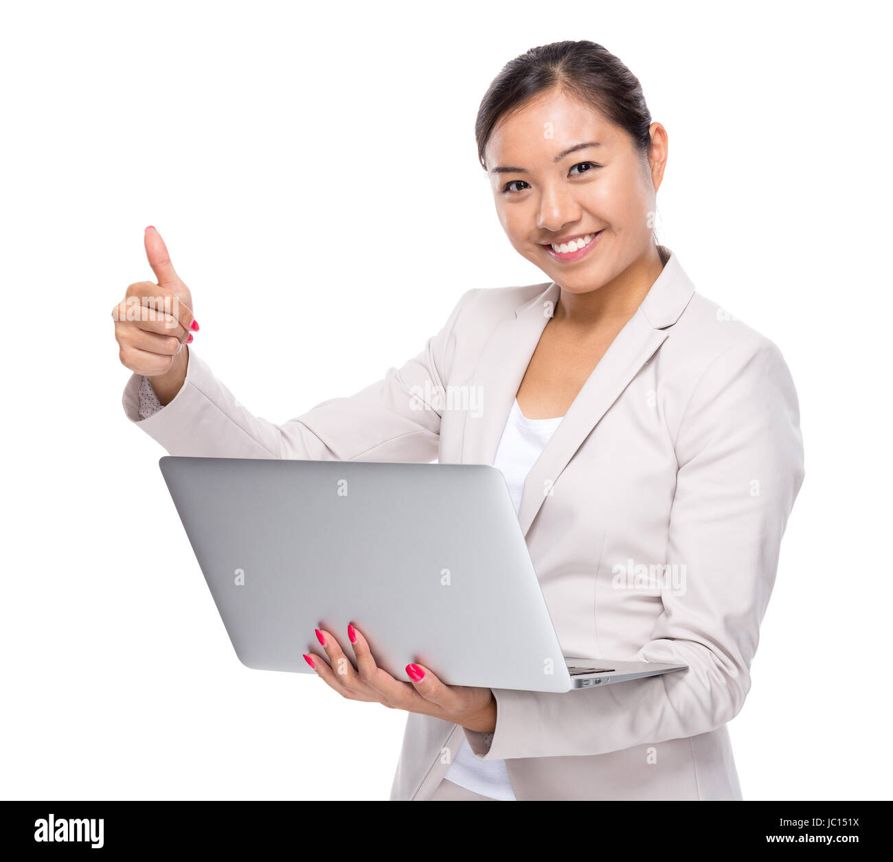 Business woman with laptop computer and thumb up Stock Photo - Alamy