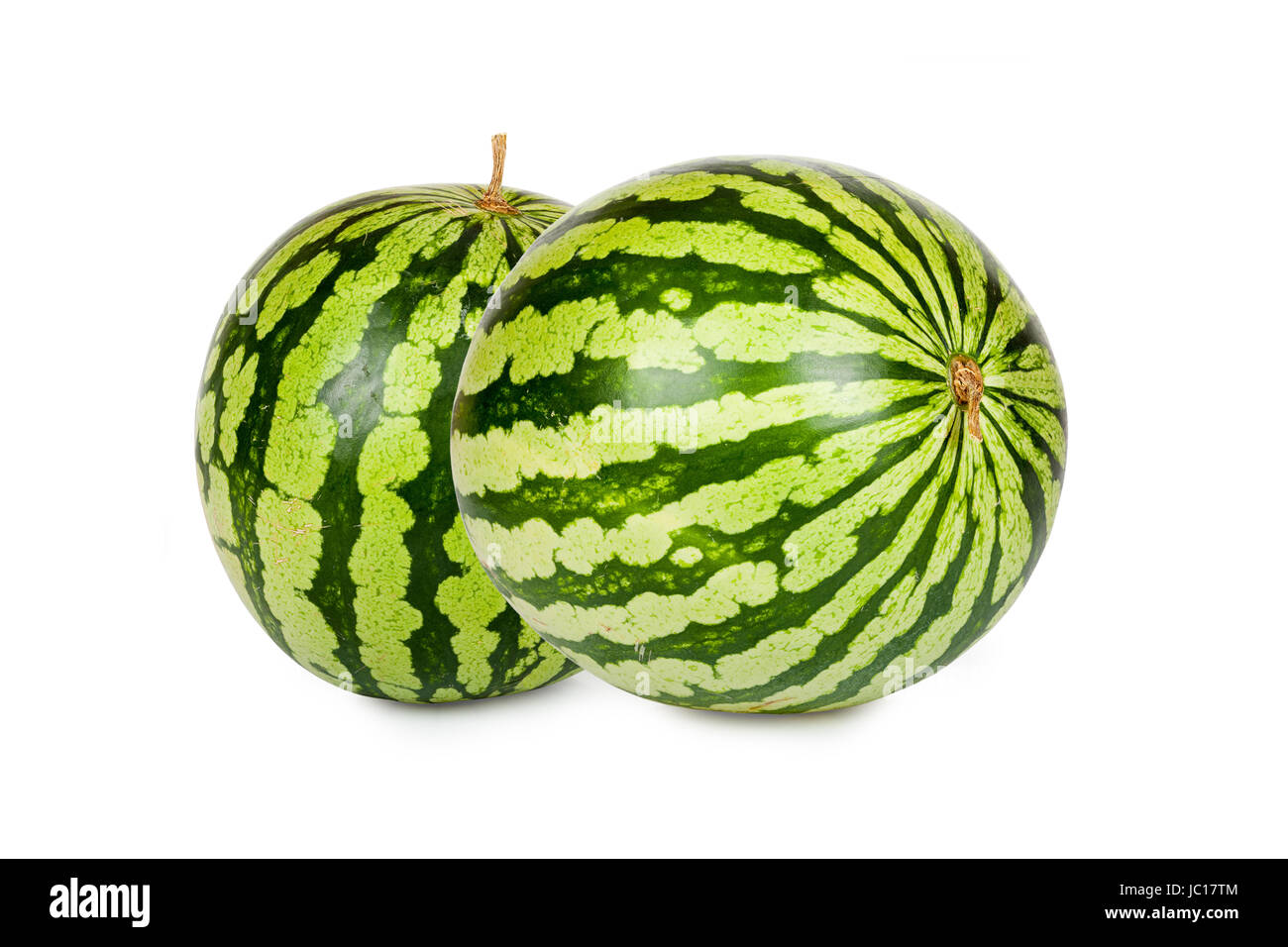 Zwei große reife Wassermelonen isoliert vor weißem Hintergrund Stock Photo