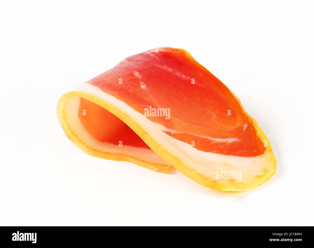 Thin slice of prosciutto crudo Stock Photo Alamy