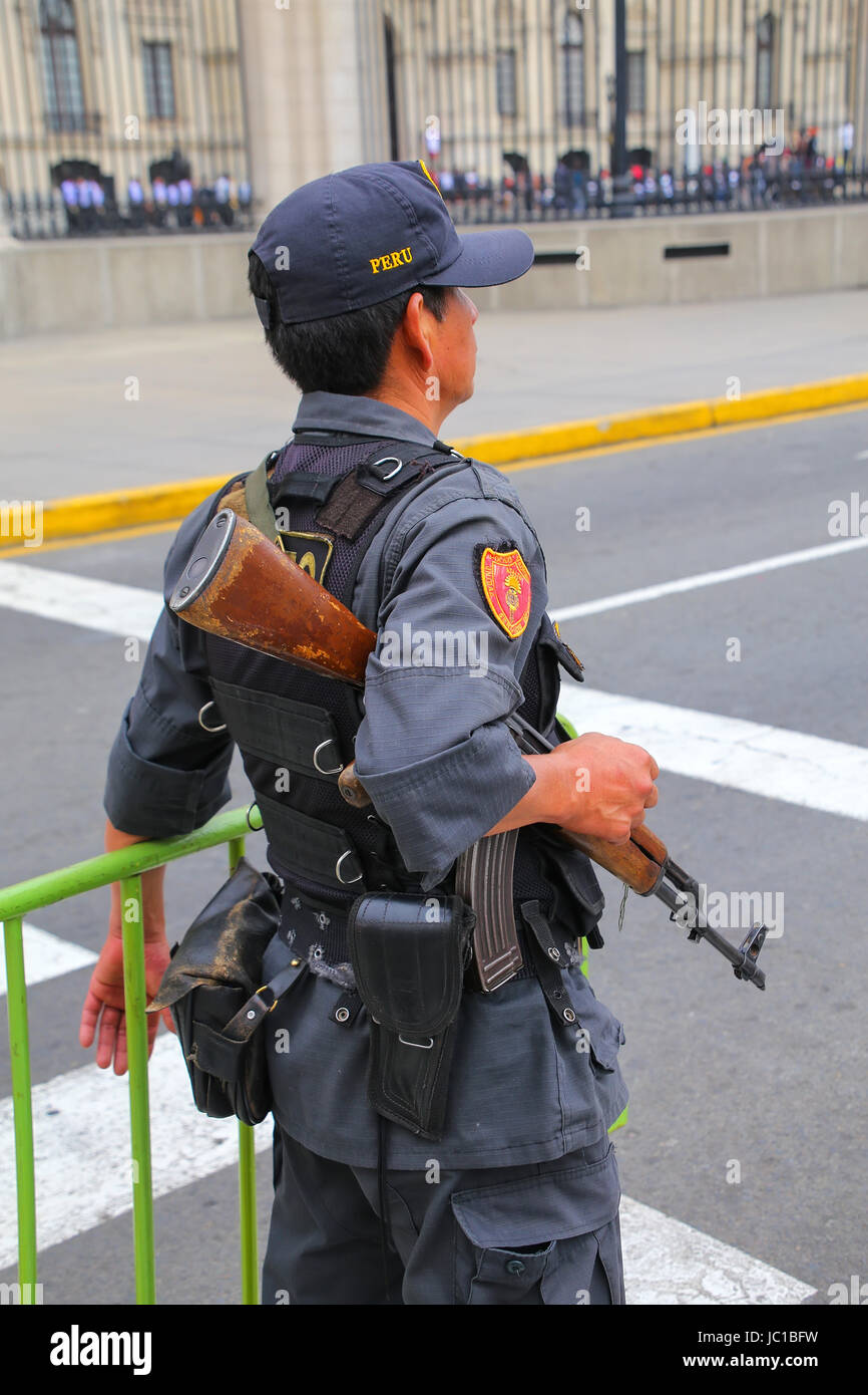 Policeman standing near Government Palace in Lima, Peru. Peruvian National Police is one of the largest police forces in South America. Stock Photo