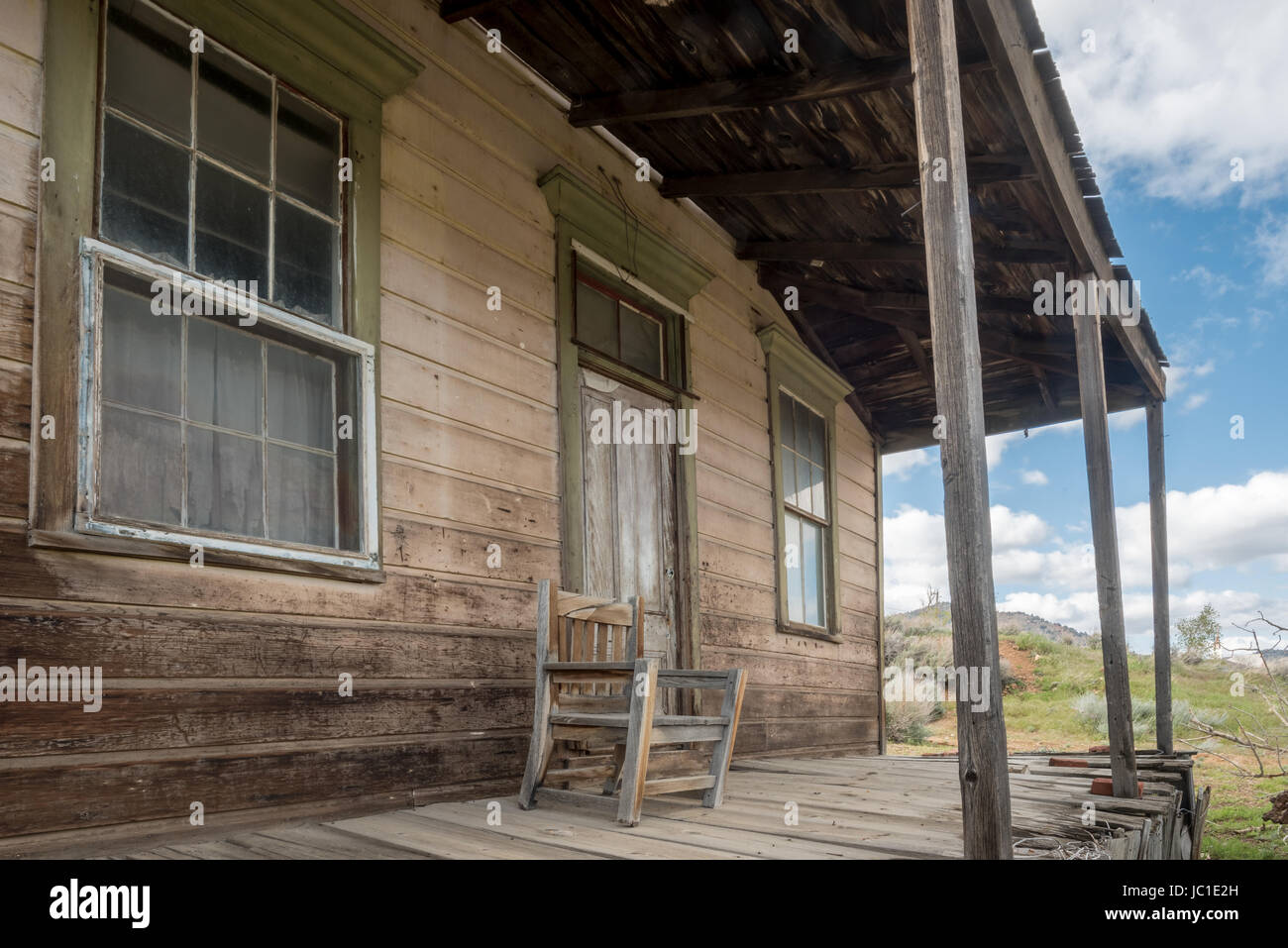 Front porch of a weathered old house in the historic mining town of Virginia City, Nevada. Stock Photo