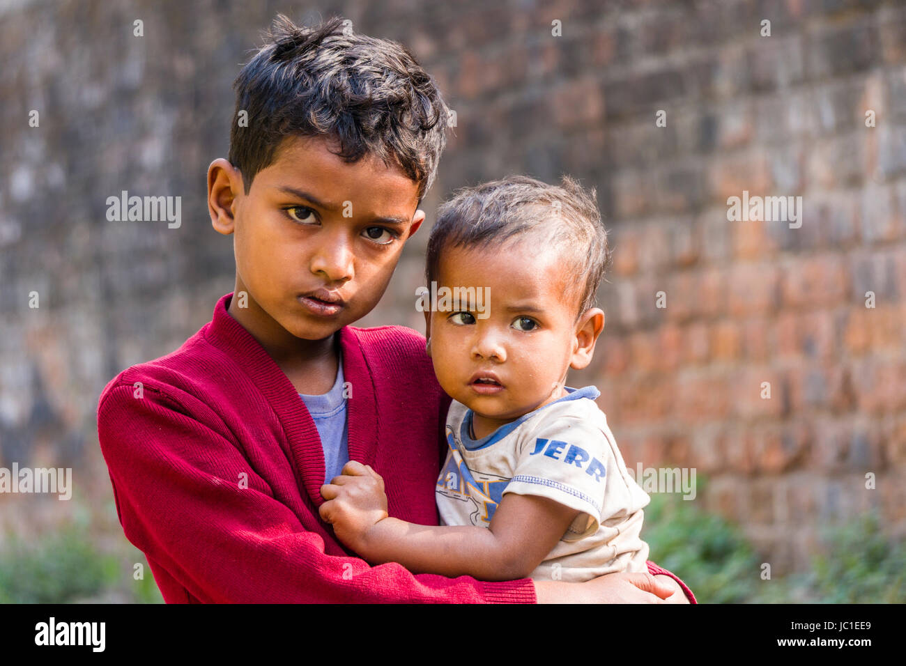 Portraits of two child boys in China Bazar slum area Stock Photo