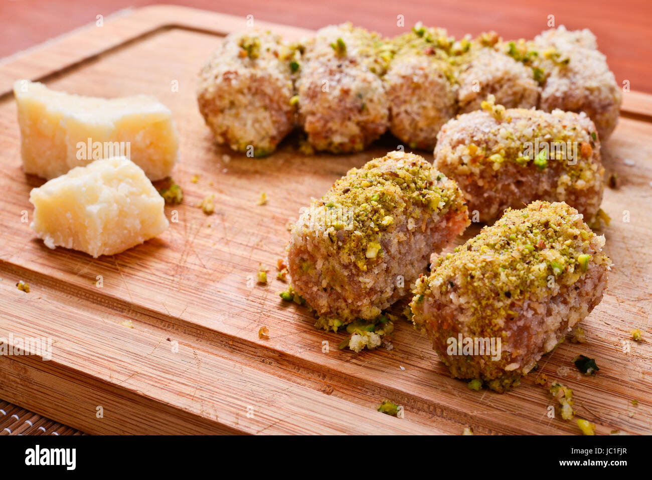 meat rolls with cream cheese and pistachio Stock Photo