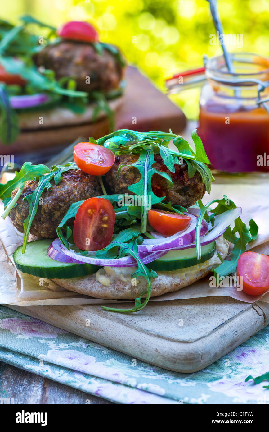 Turkish Style Lamb Kofta With Rocket Lettuce Salad And Houmus On Pitta 