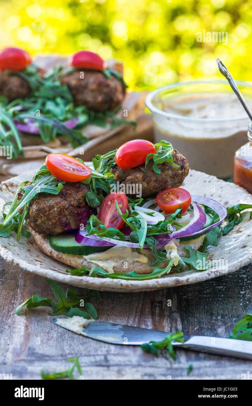 Turkish Style Lamb Kofta With Rocket Lettuce Salad And Houmus On Pitta 