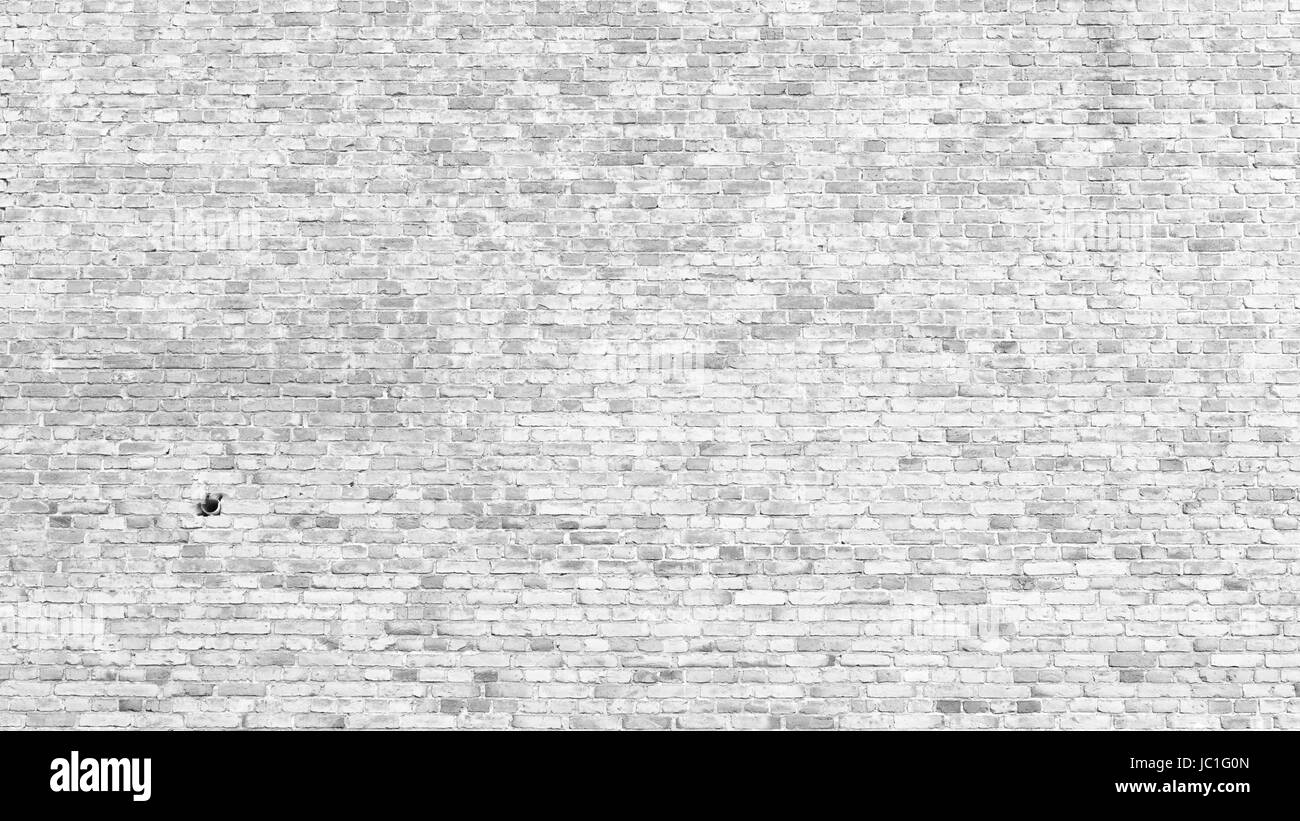 Old white brick wall texture background exterior Stock Photo - Alamy