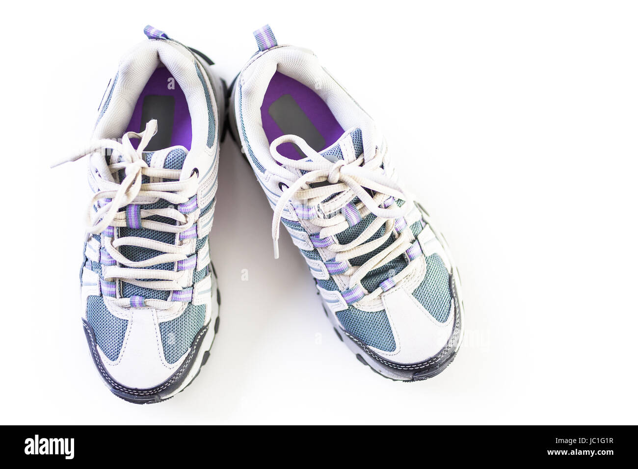 Pair of new womens hiking shoes on a white background Stock Photo - Alamy
