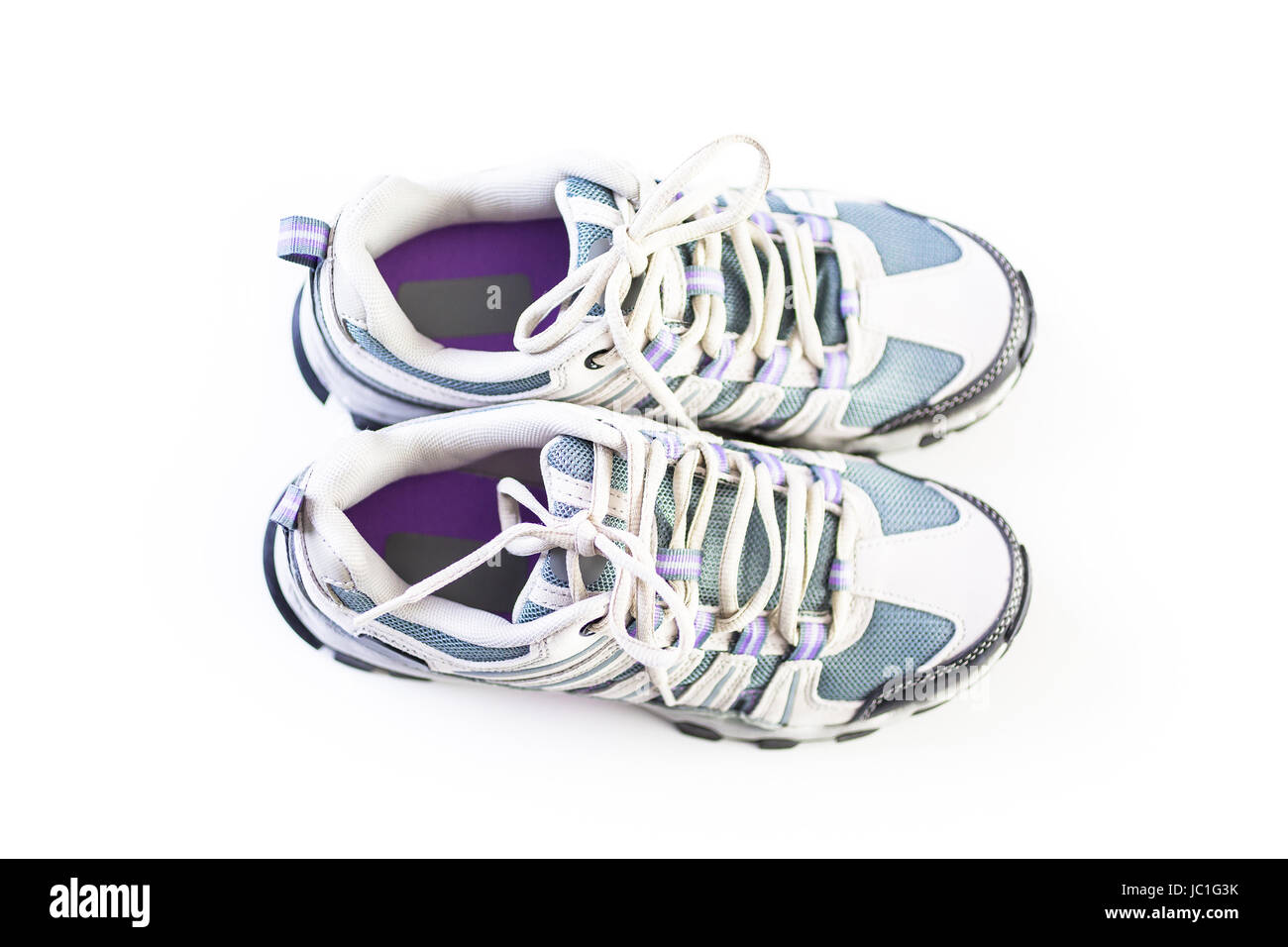 Pair of new womens hiking shoes on a white background Stock Photo - Alamy