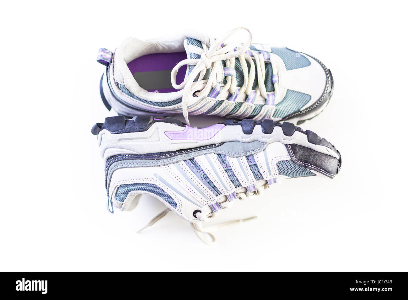 Pair of new womens hiking shoes on a white background Stock Photo - Alamy